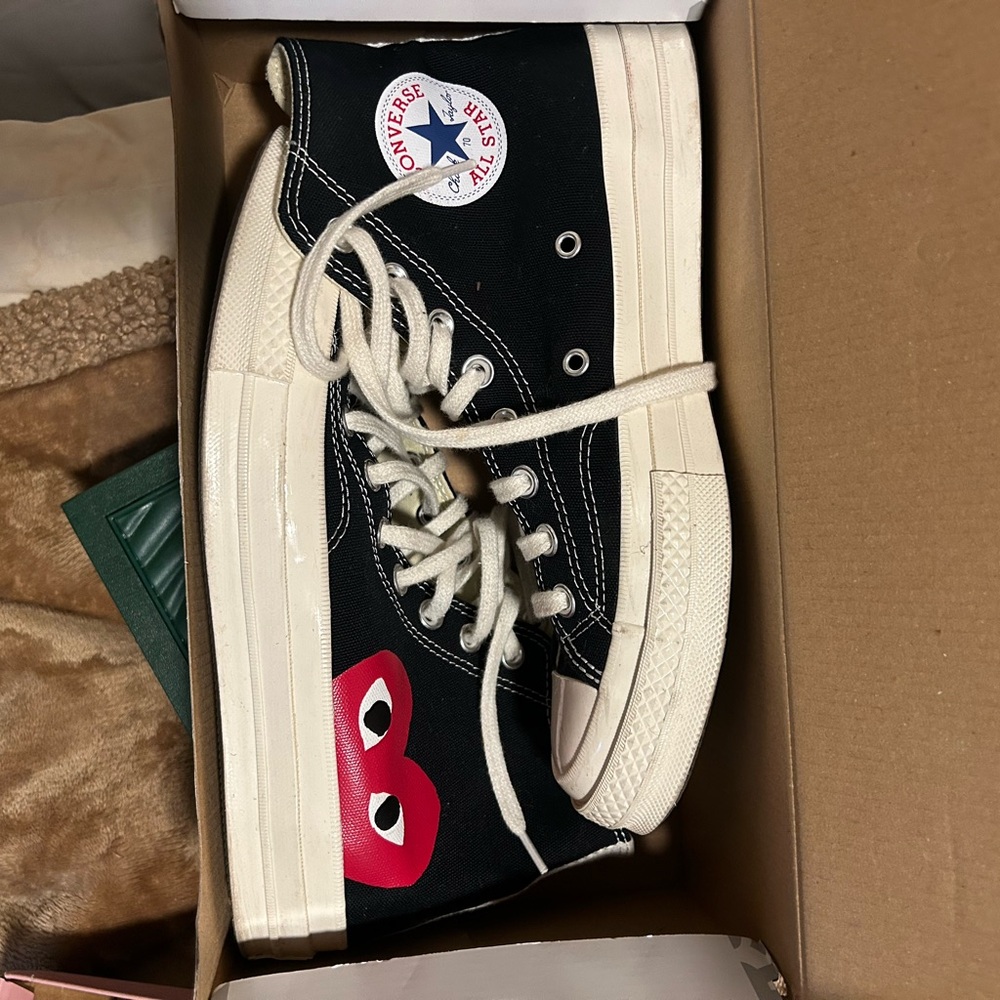 Comme de Garçon high top Converse Black Sneakers